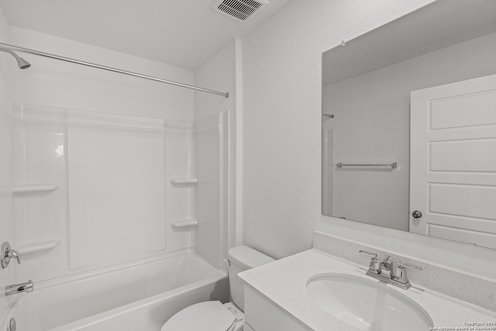 4068 Paddock Trail Seguin, TX 78155 - Photo 29 of 34 a bathroom with a granite countertop sink toilet and shower