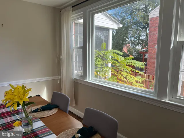 a bedroom with furniture and a fireplace
