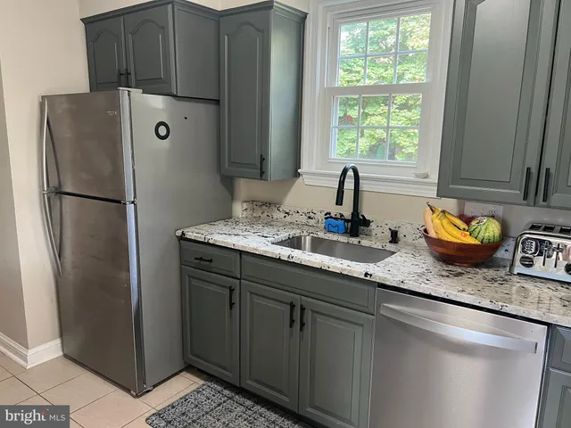 a bathroom with a toilet and a sink