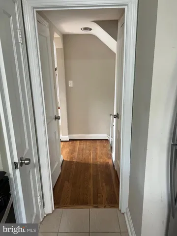 a workspace with furniture and wooden floor