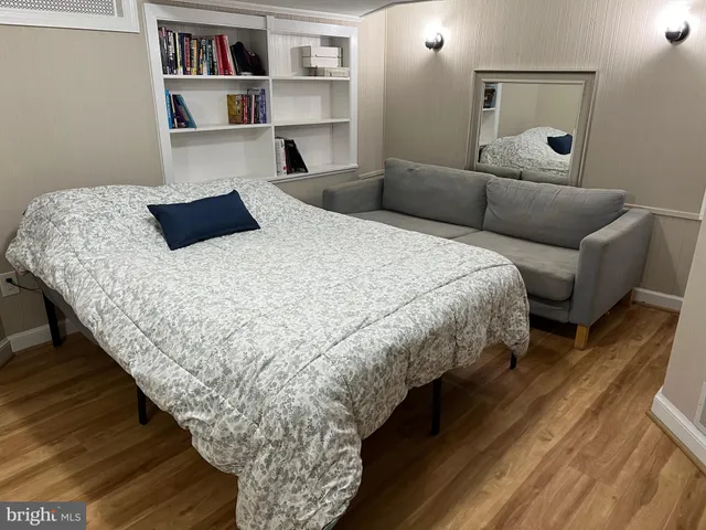 a view of a livingroom with gym equipment