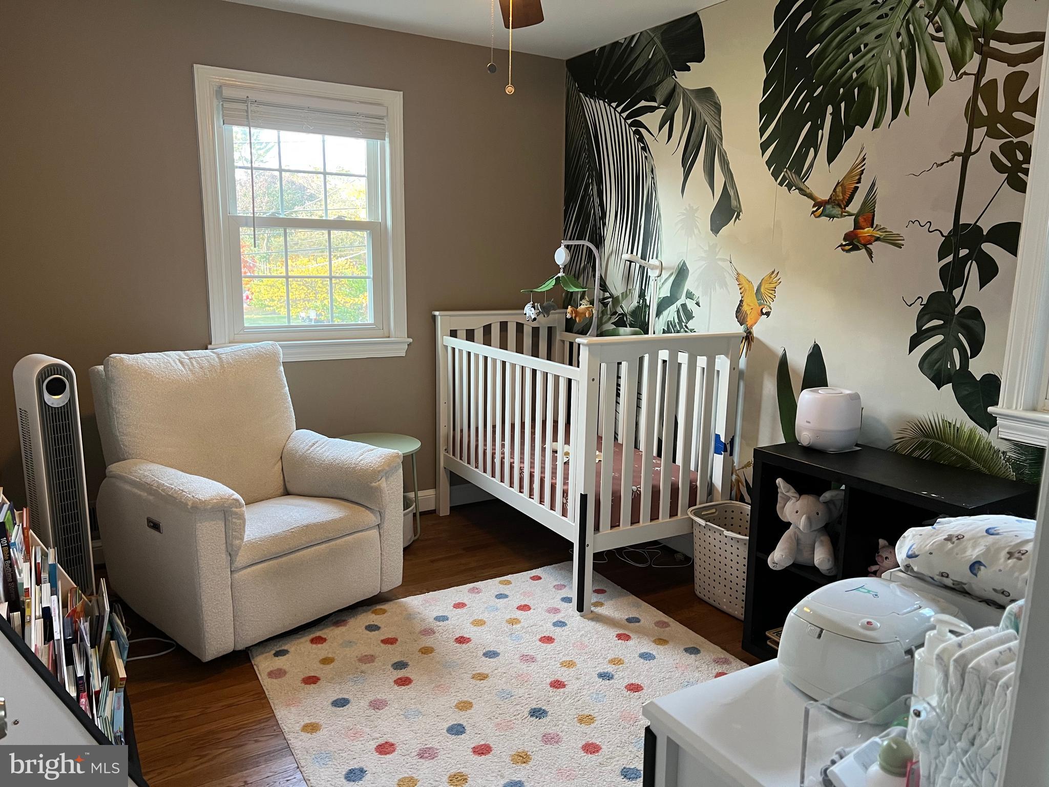 405 Gilmoure Drive Silver Spring, MD 20901 - Photo 42 of 53 a living room with furniture and a window