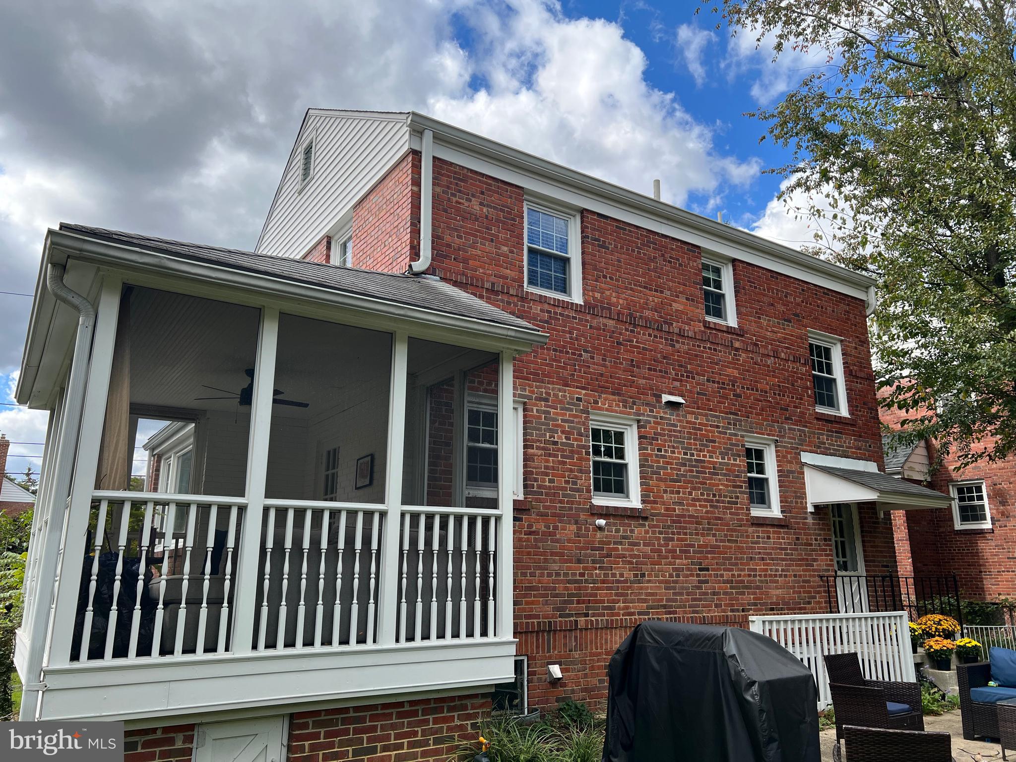405 Gilmoure Drive Silver Spring, MD 20901 - Photo 44 of 53 a view of a brick house with a window