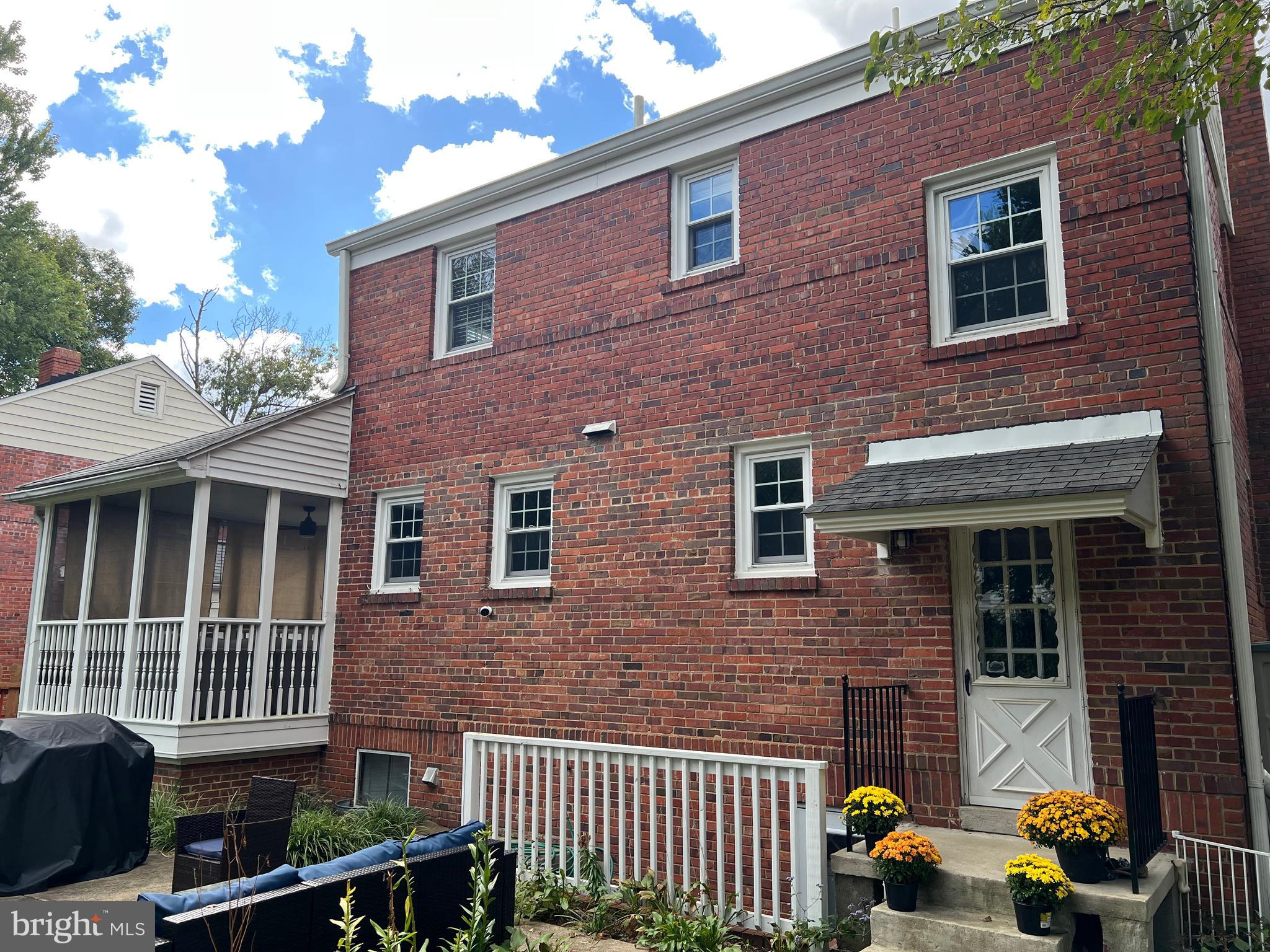 405 Gilmoure Drive Silver Spring, MD 20901 - Photo 45 of 53 a front view of a house with a garden