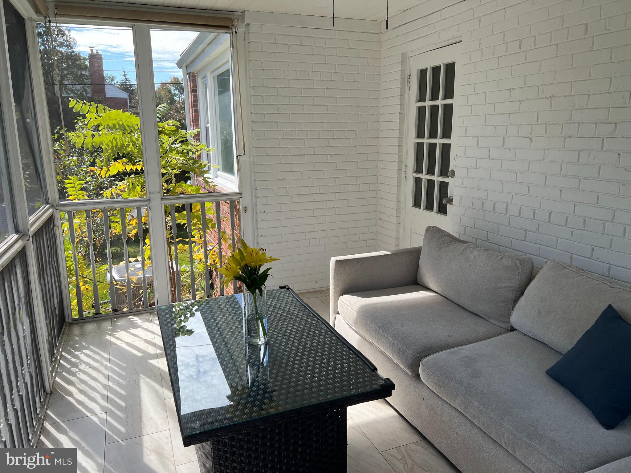 405 Gilmoure Drive Silver Spring, MD 20901 - Photo 9 of 53 a view of balcony with furniture