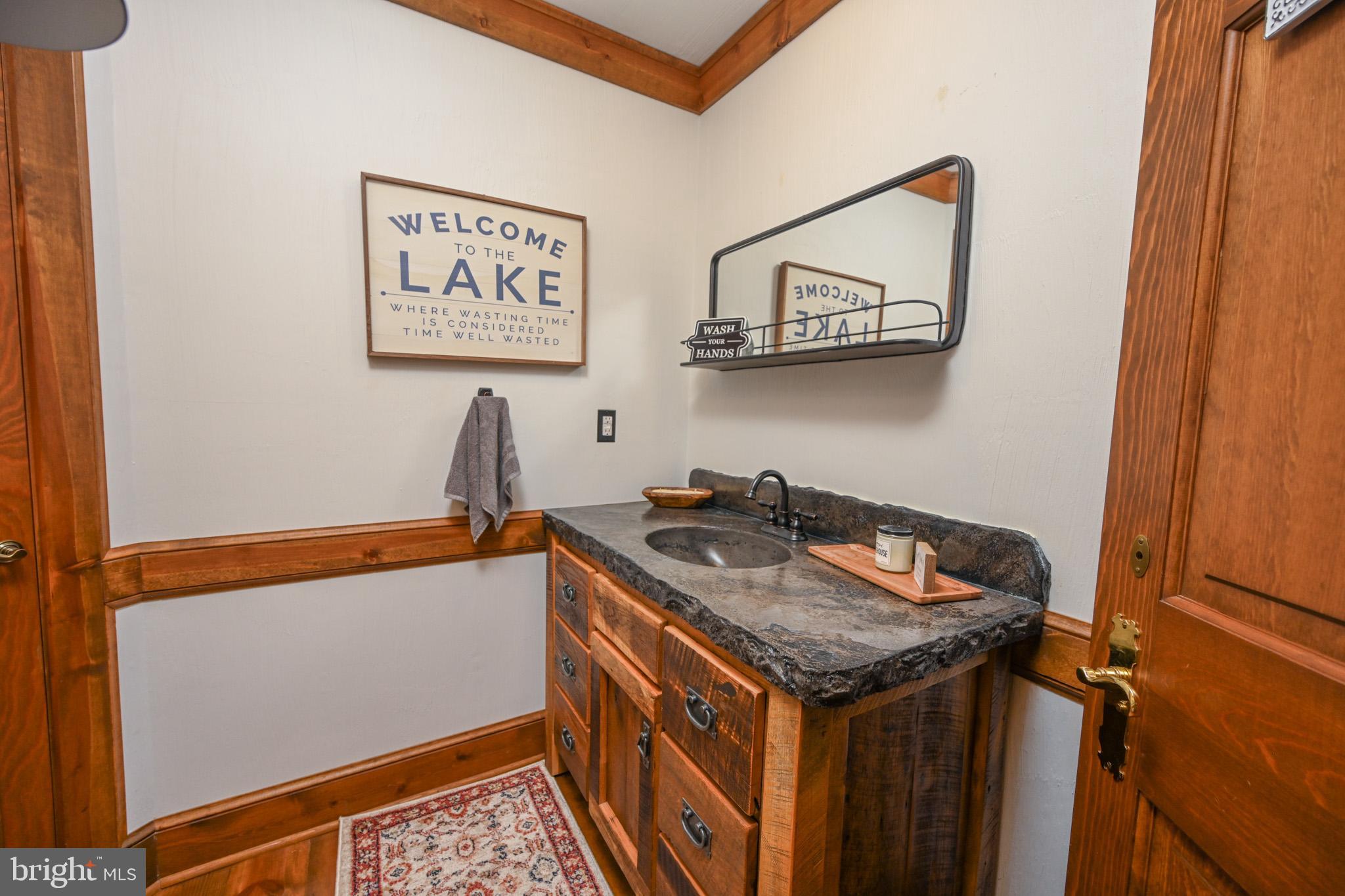 1087 Pergin Farm Road Oakland, MD 21550 - Photo 54 of 149 1/2 bath off of the landing to the stairs.