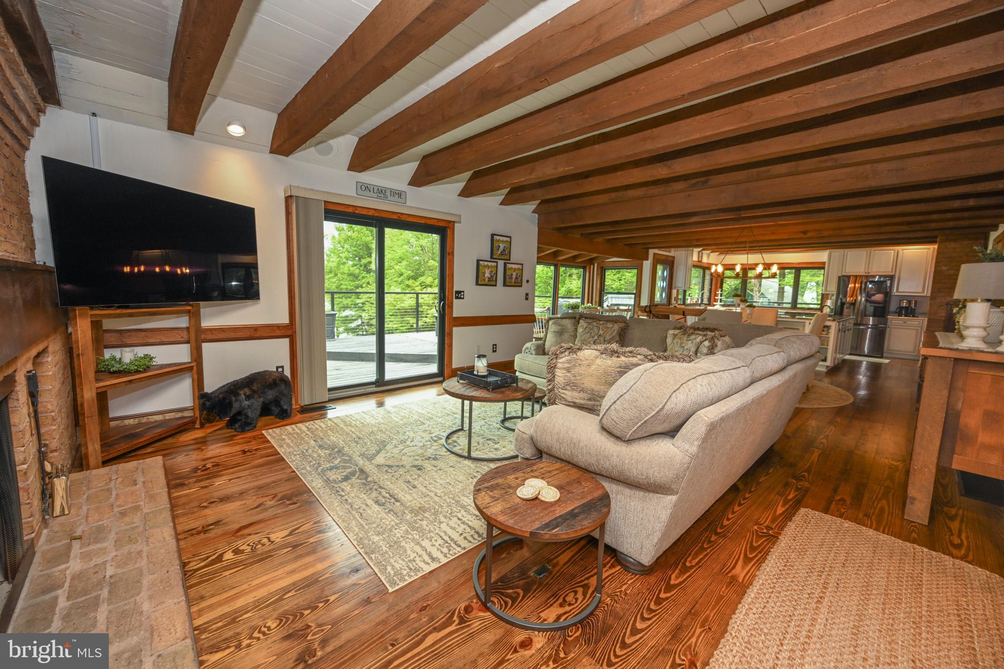 1087 Pergin Farm Road Oakland, MD 21550 - Photo 9 of 149 Beautiful wood floors throughout & beamed ceilings