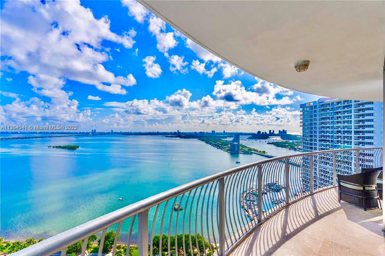 a view of balcony with wooden floor