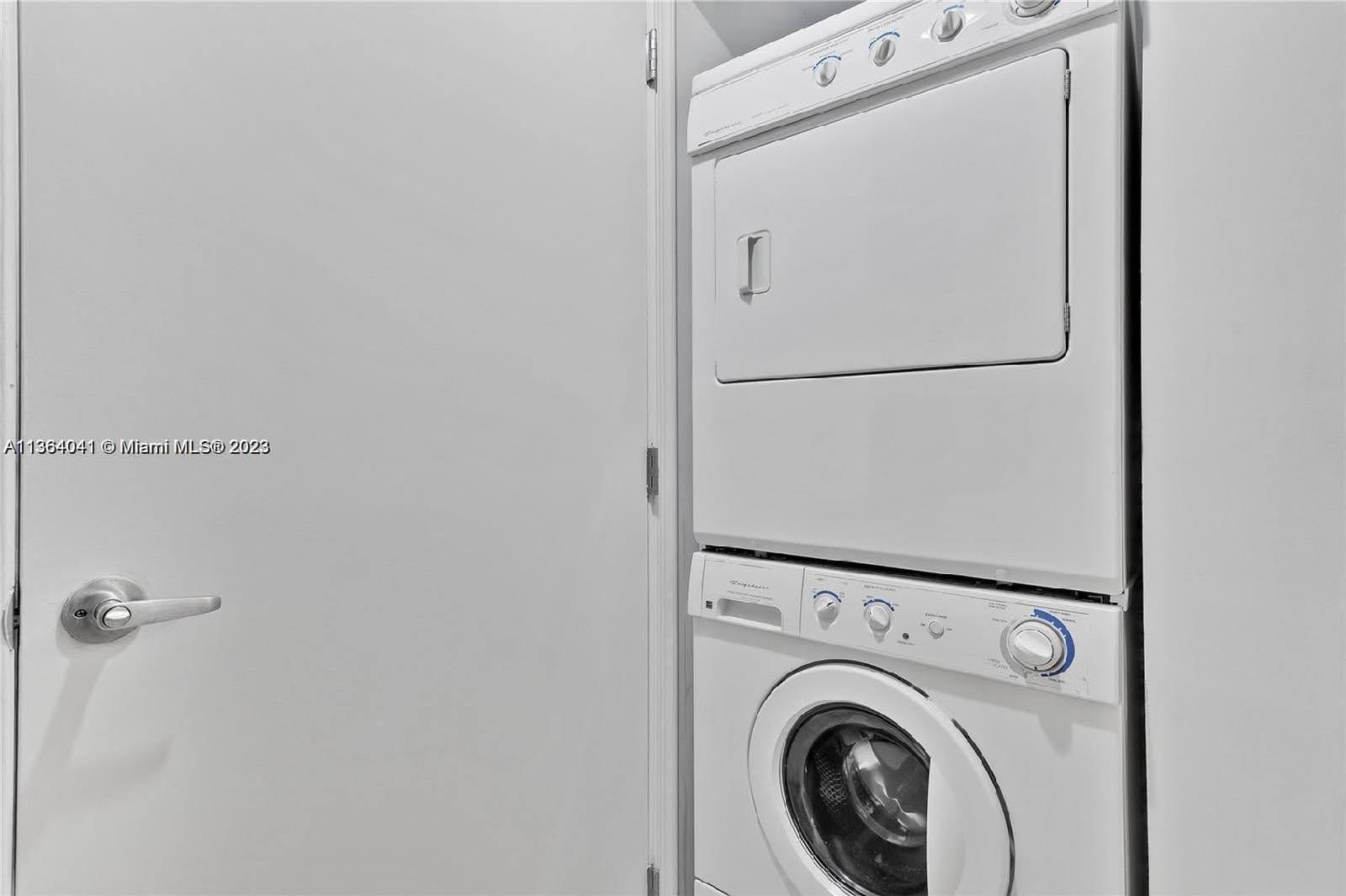 Edgewater Miami, FL 33132 - Photo 7 of 11 a utility room with dryer and washer