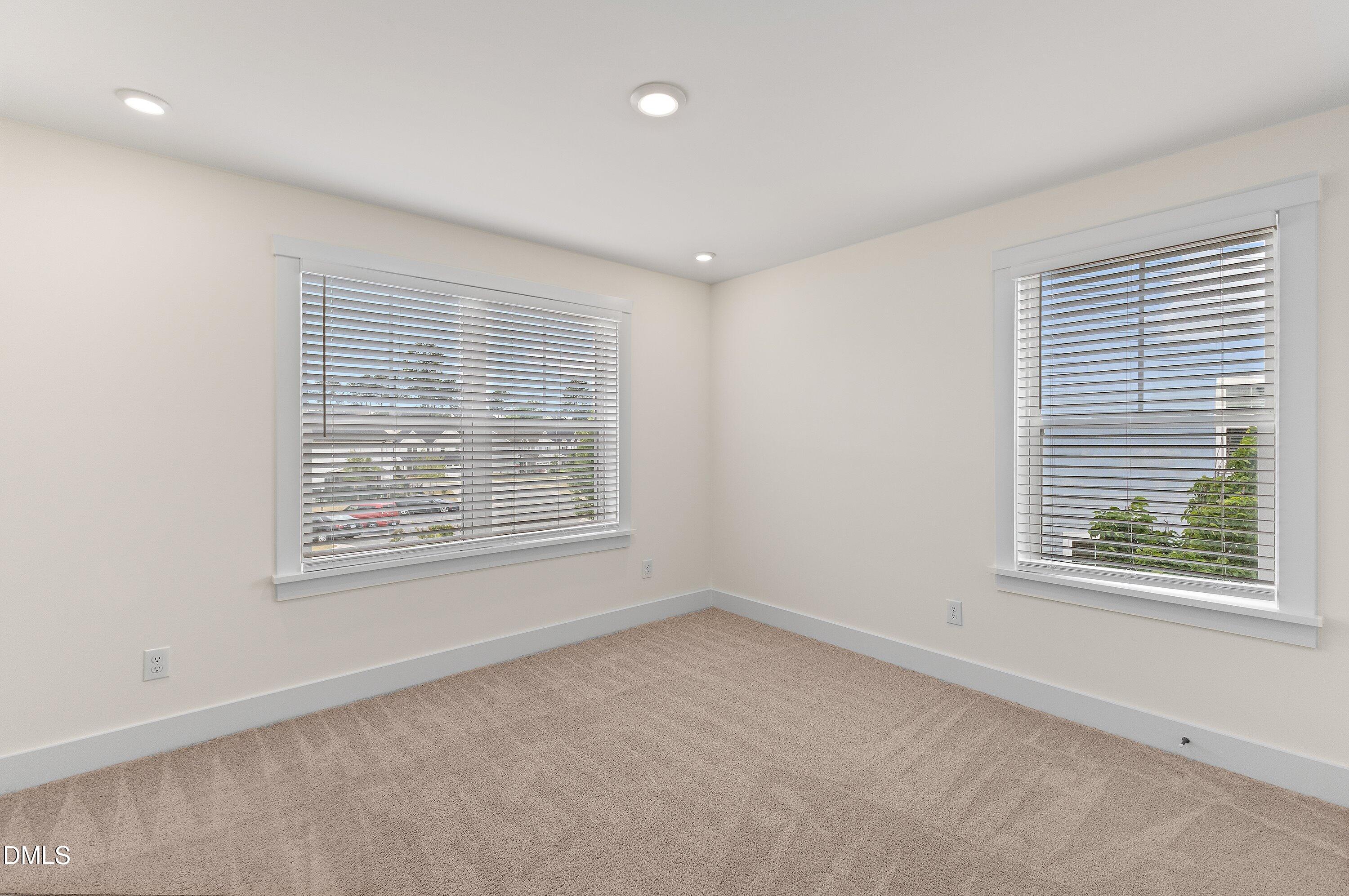 156 Sears Ridge Lane Morrisville, NC 27560 - Photo 30 of 49 a view of an empty room with a window