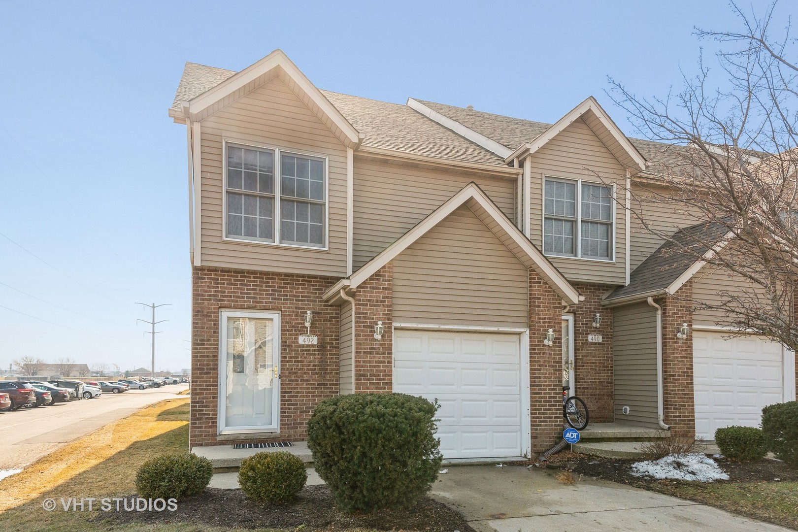 492 South Peace Road Sycamore, IL 60178 - Photo 1 of 10 a view of a white house next to a yard