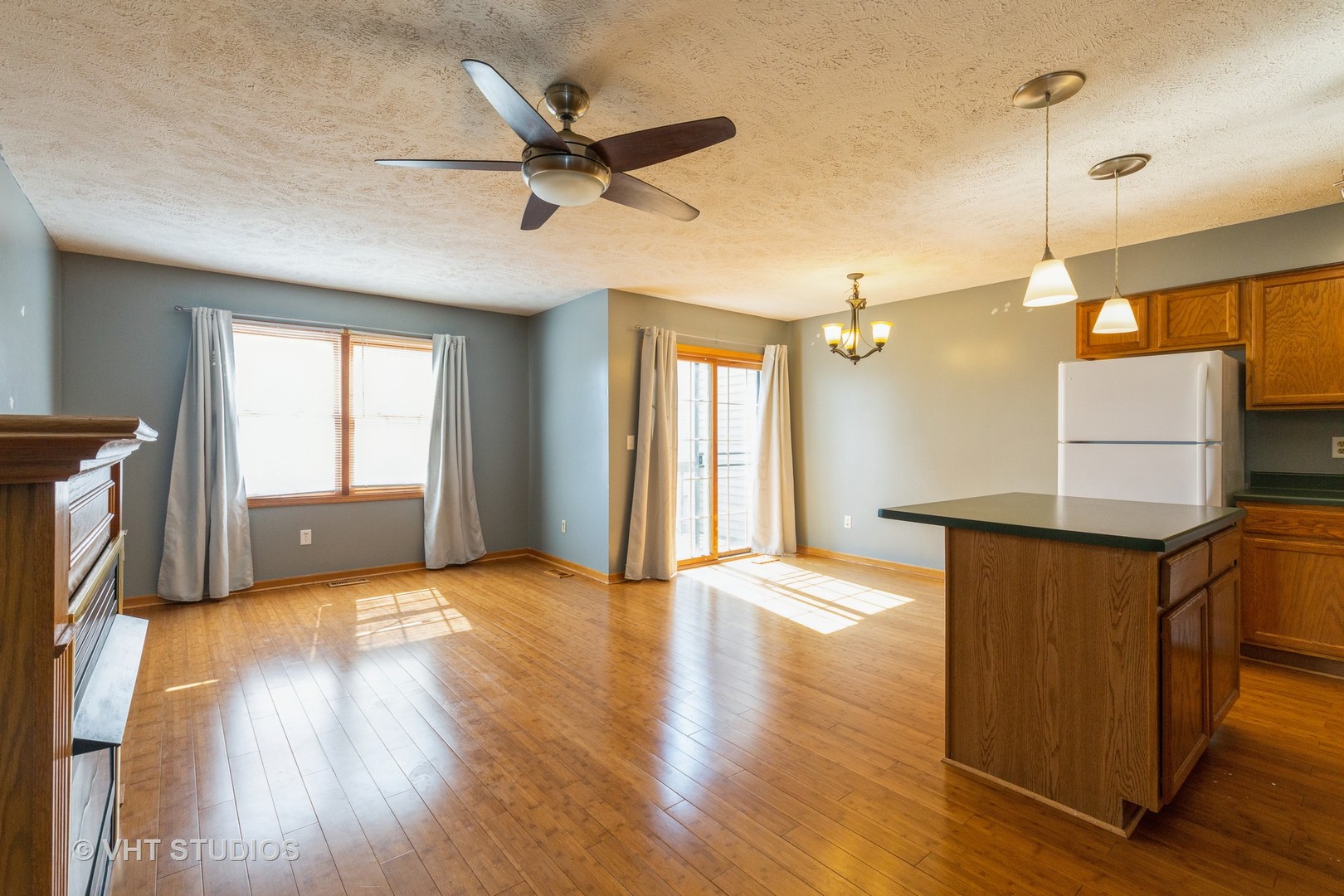 492 South Peace Road Sycamore, IL 60178 - Photo 2 of 10 a view of an empty room with window and wooden floor