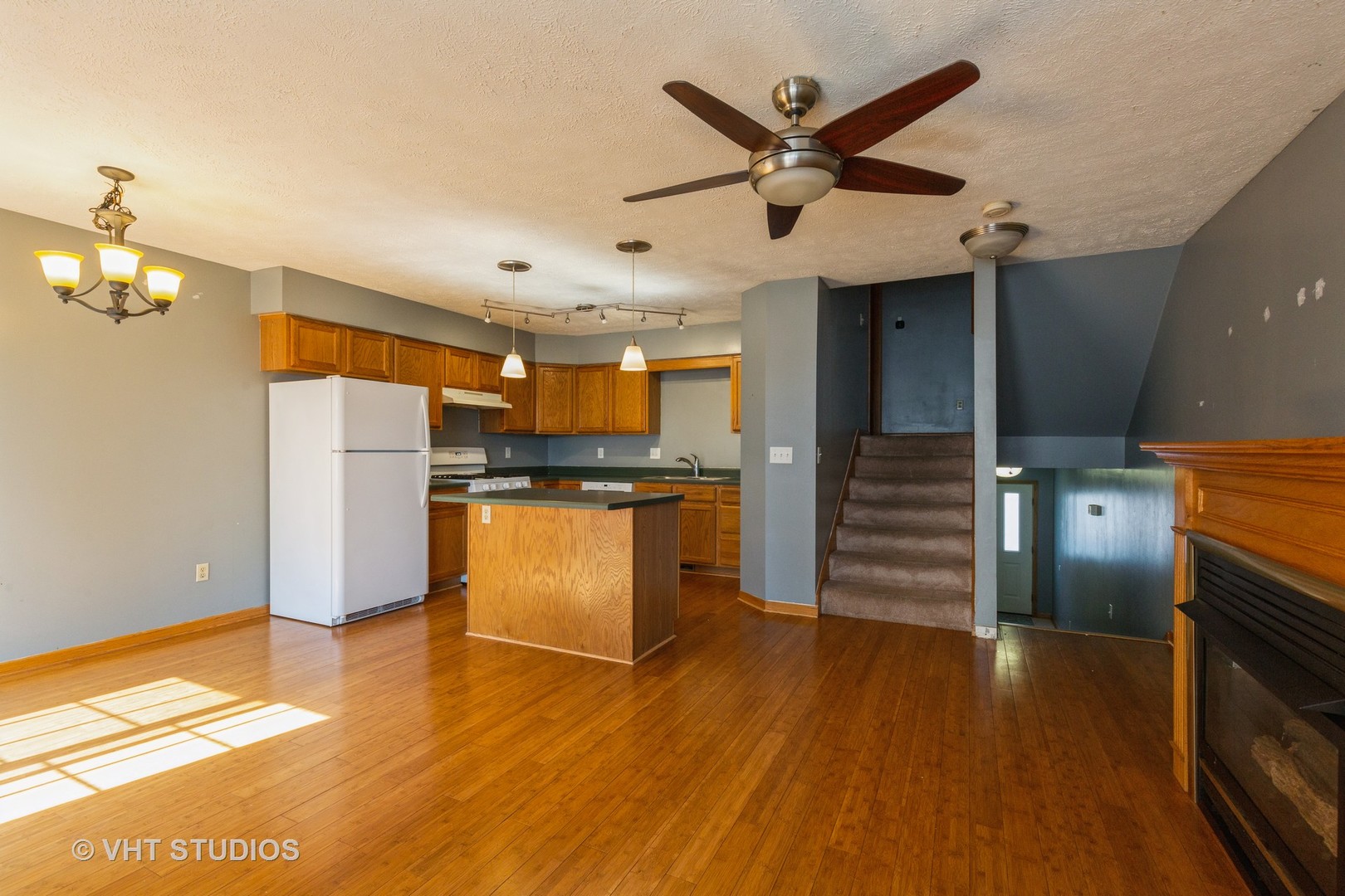 492 South Peace Road Sycamore, IL 60178 - Photo 3 of 10 a kitchen with stainless steel appliances kitchen island granite countertop a refrigerator and a stove