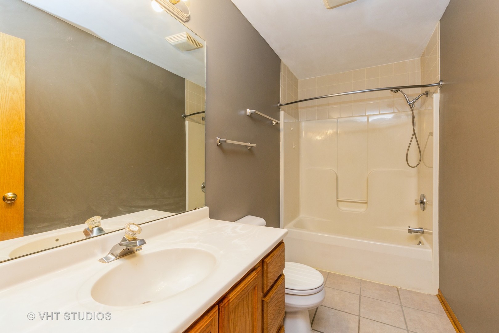 492 South Peace Road Sycamore, IL 60178 - Photo 4 of 10 a bathroom with a sink a toilet and shower