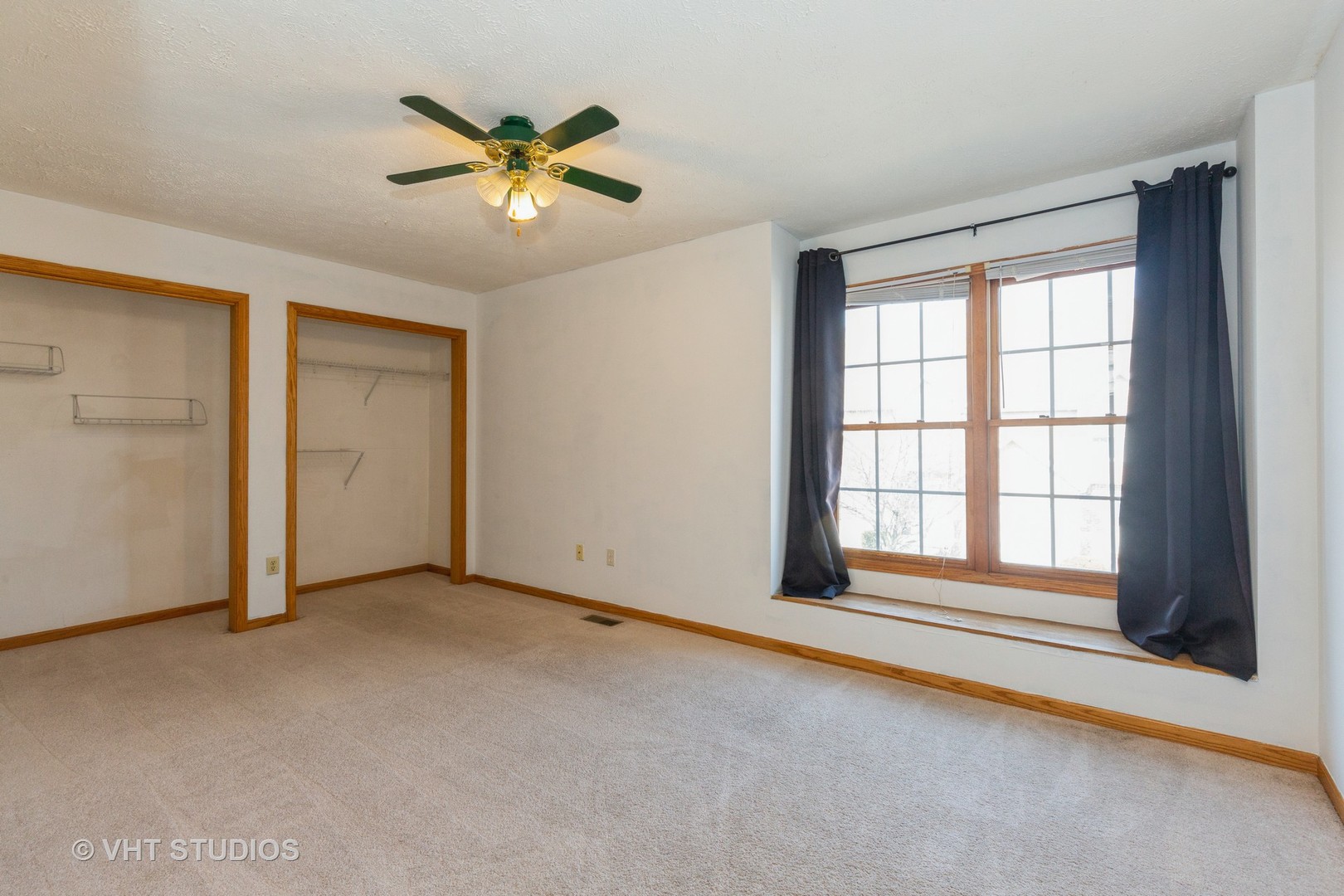 492 South Peace Road Sycamore, IL 60178 - Photo 5 of 10 a view of an empty room with chandelier fan and fire place