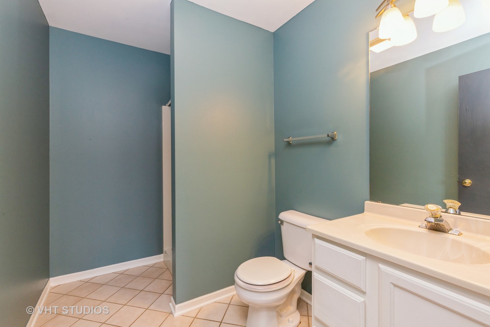 492 South Peace Road Sycamore, IL 60178 - Photo 7 of 10 a bathroom with a sink and a toilet