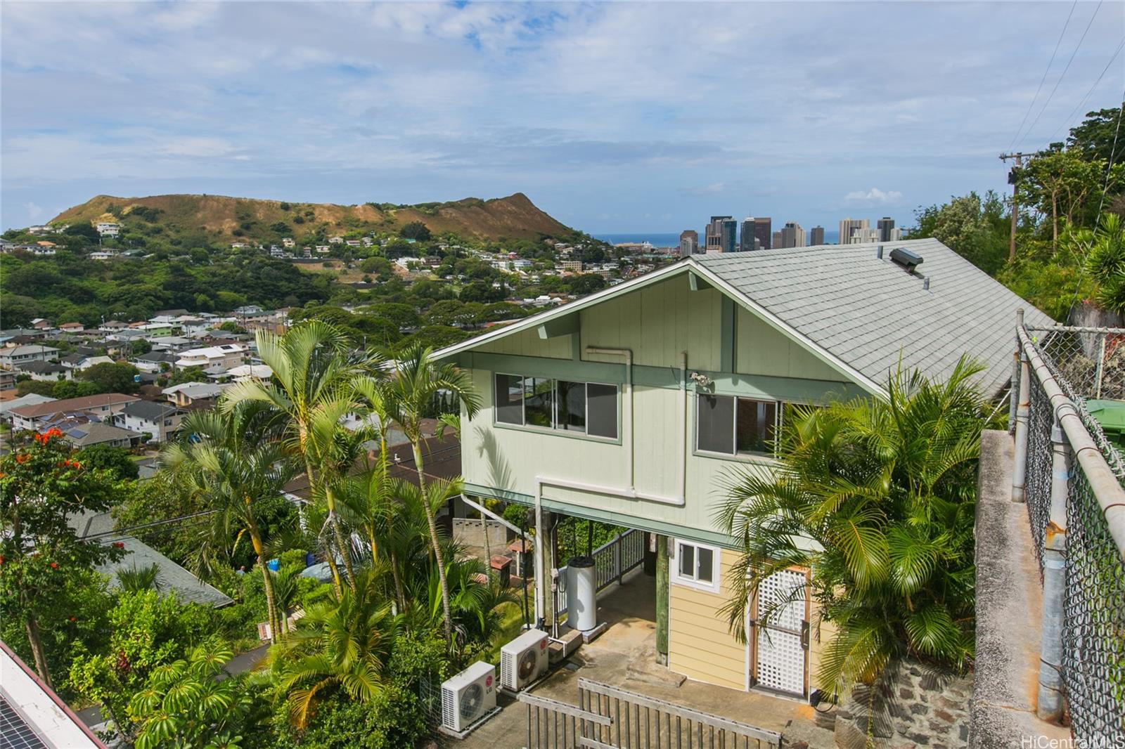 2407 Pacific Heights Road Honolulu, HI 96813 - Photo 1 of 1 a house with a tree in front of it