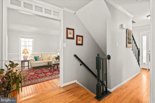 a bath tub sitting in a bathroom next to a window