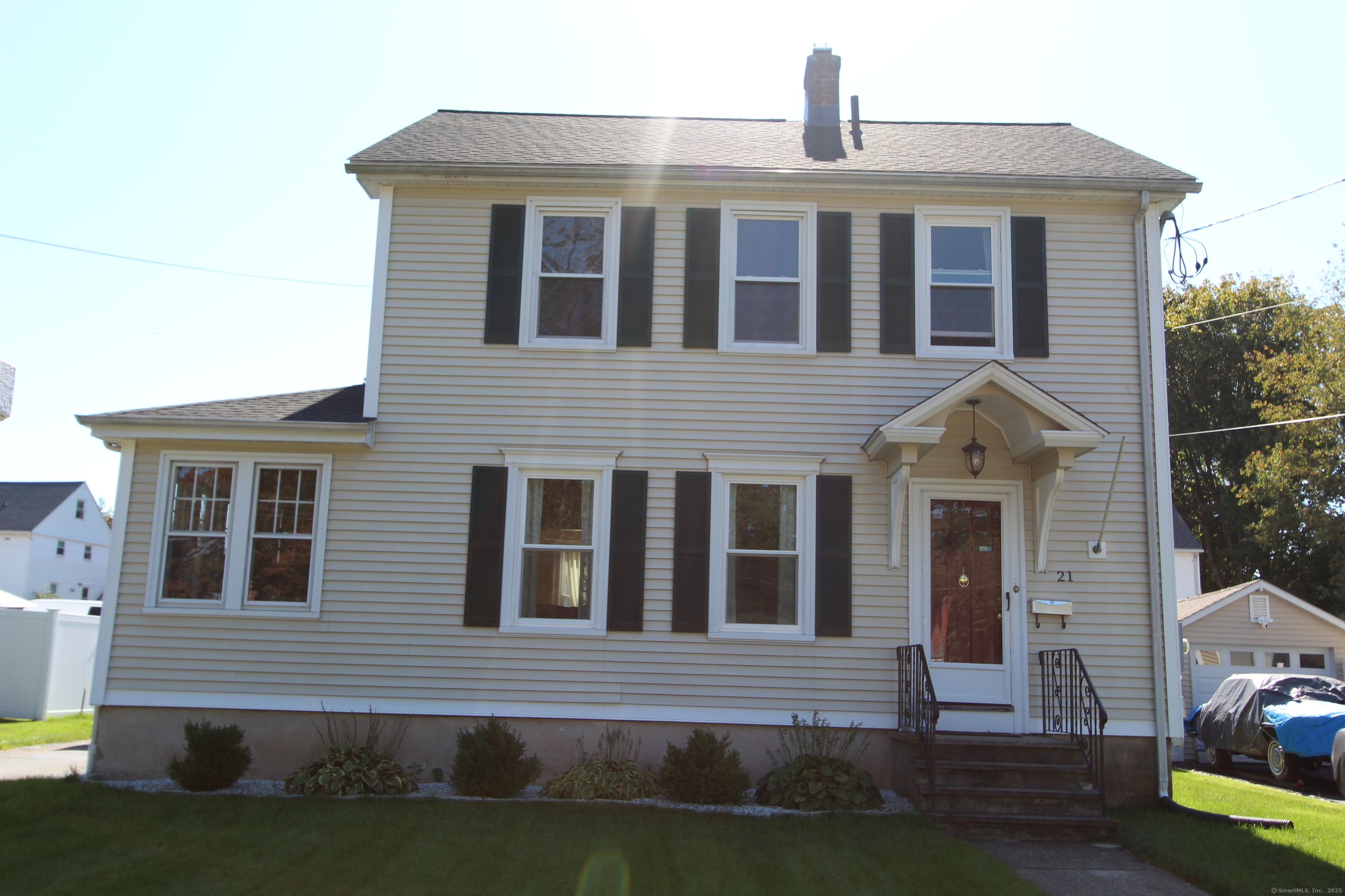 21 Dale Road Wethersfield, CT 06109 - Photo 2 of 25 a front view of a house with garden