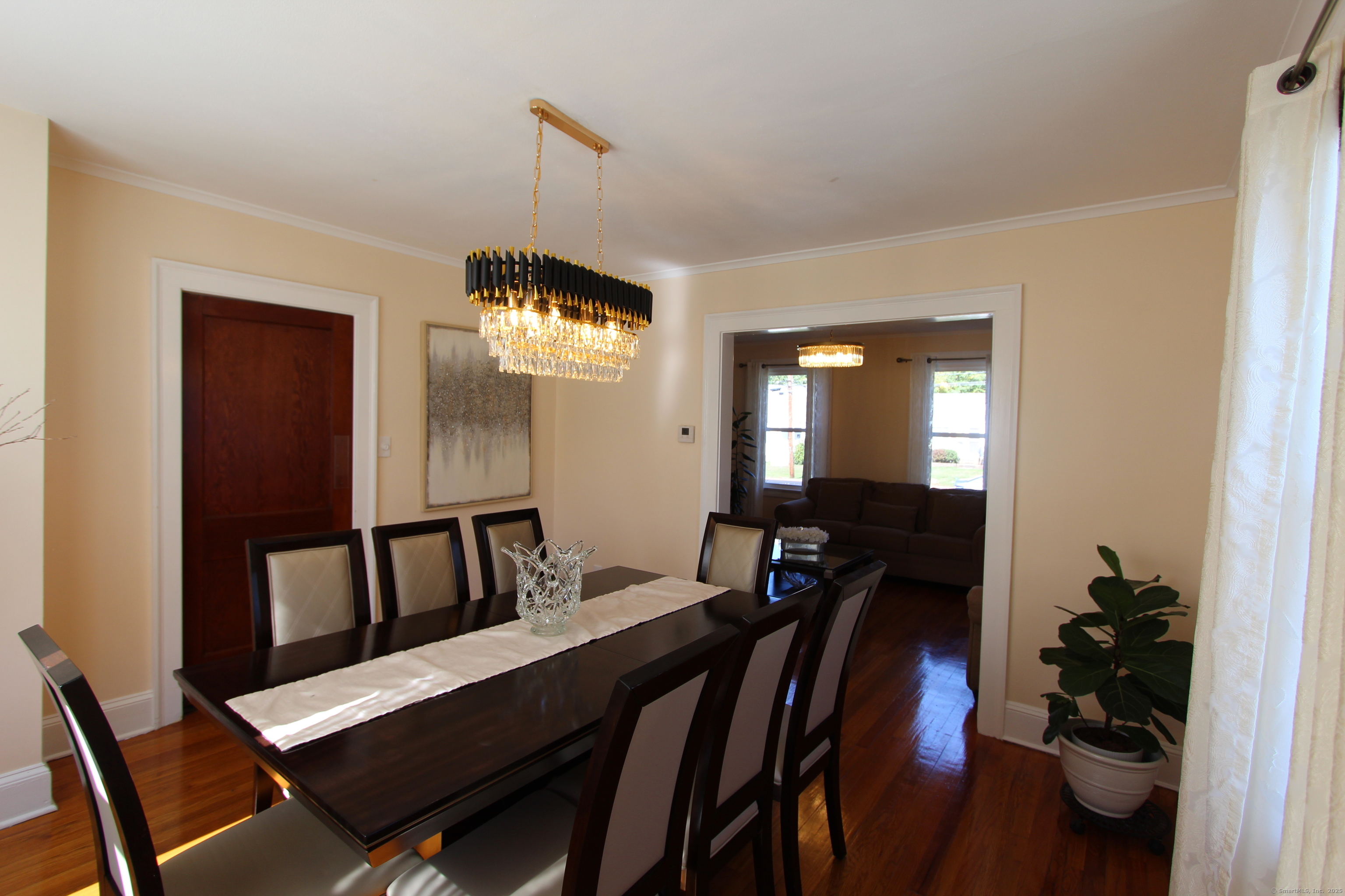21 Dale Road Wethersfield, CT 06109 - Photo 24 of 25 a view of a dining room with furniture and window