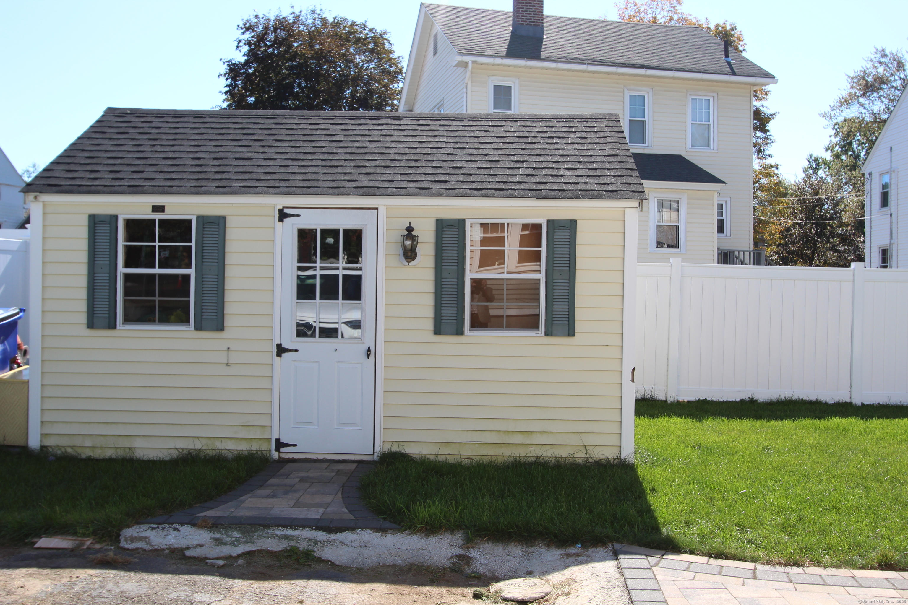 21 Dale Road Wethersfield, CT 06109 - Photo 6 of 25 a front view of a house with a garden