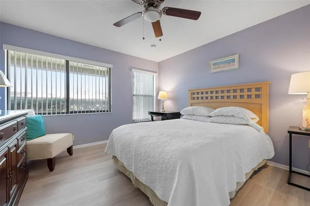 a bedroom with a bed and furniture