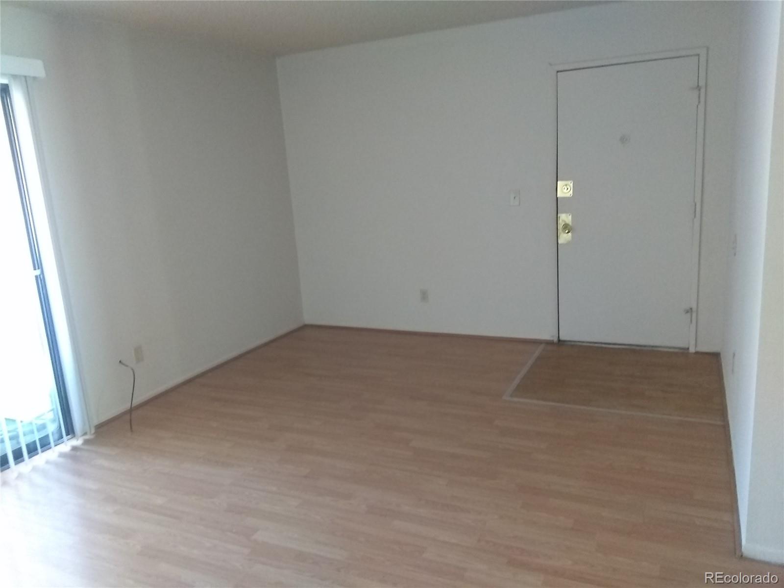 an empty room with an entryway