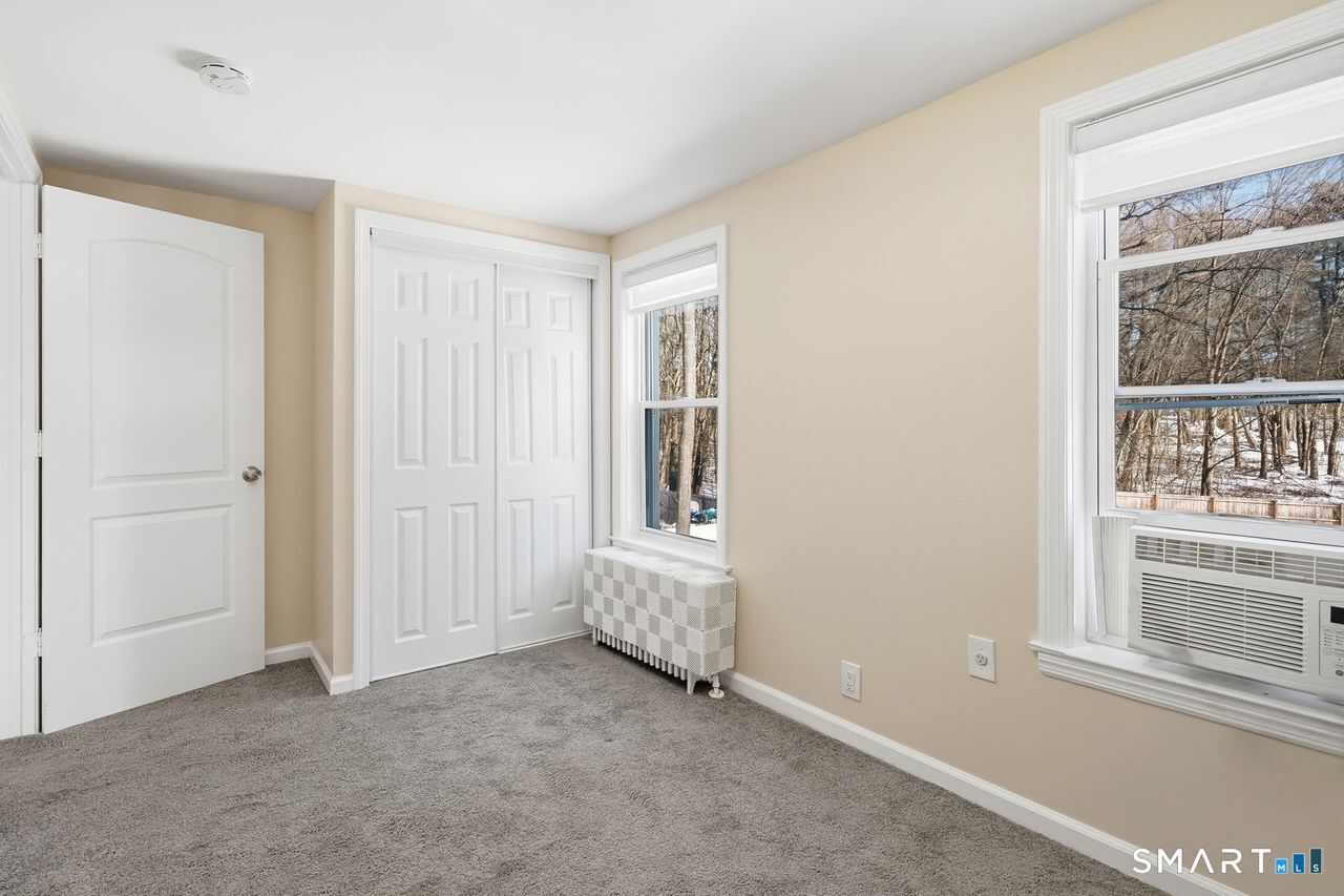 206 Gale Avenue Meriden, CT 06450 - Photo 16 of 33 an empty room with windows