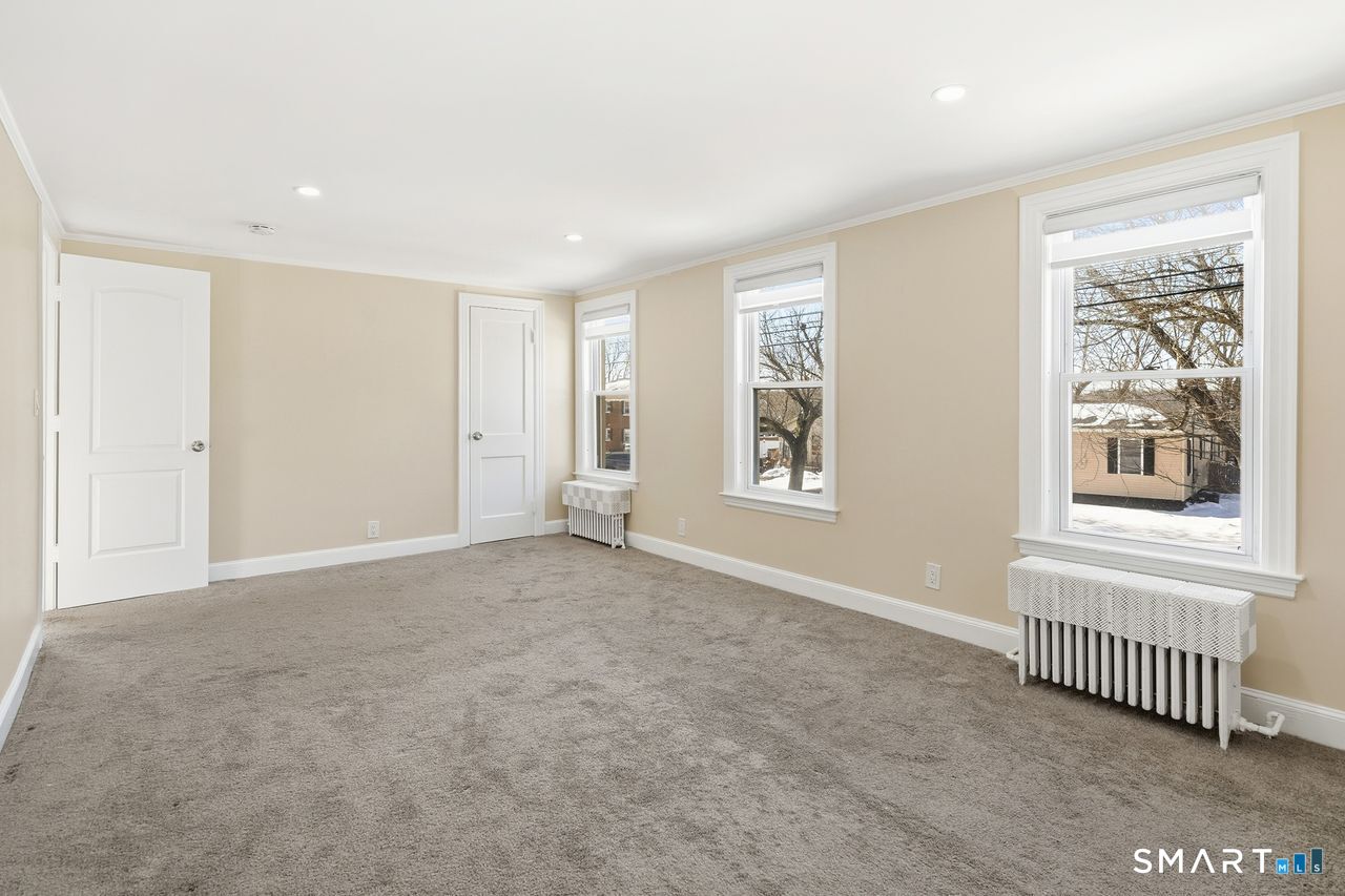 206 Gale Avenue Meriden, CT 06450 - Photo 18 of 33 an empty room with windows