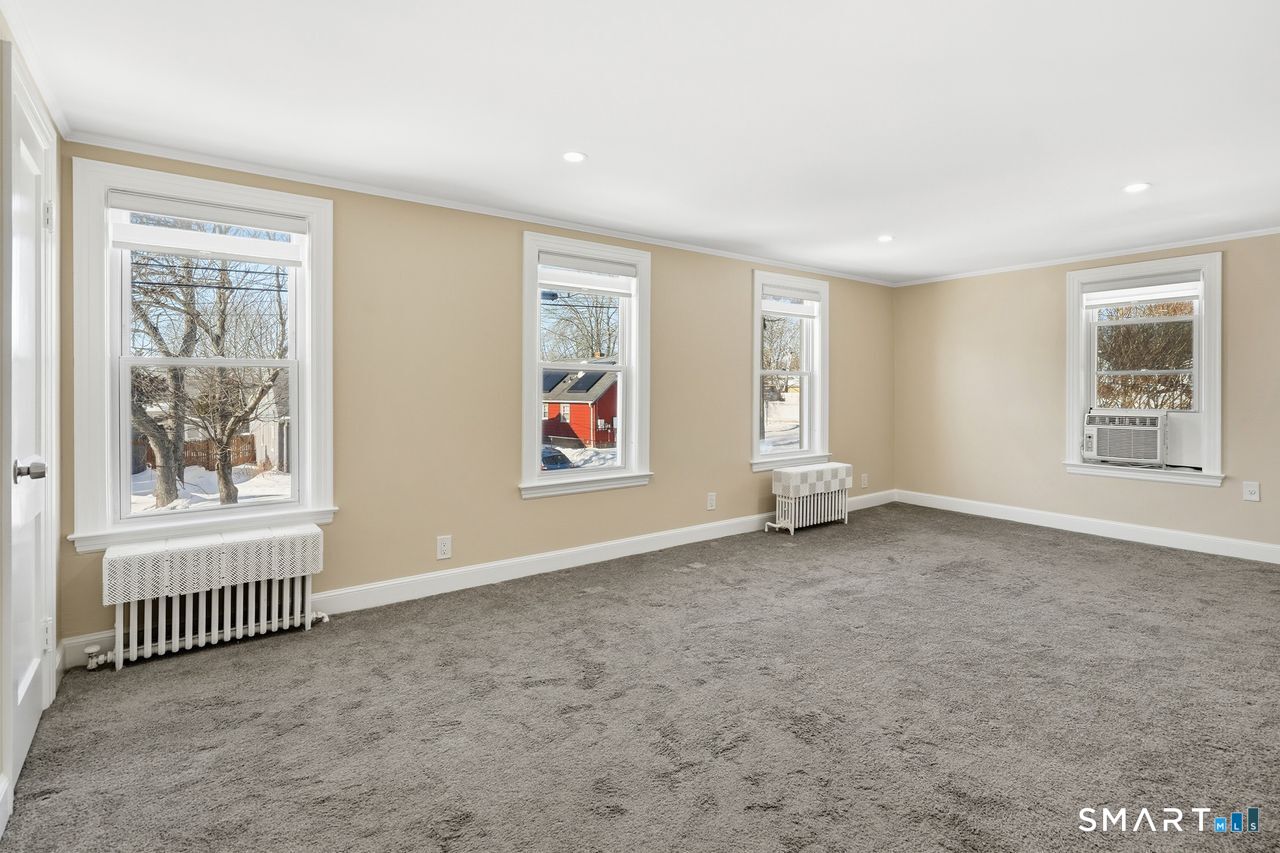 206 Gale Avenue Meriden, CT 06450 - Photo 20 of 33 an empty room with windows