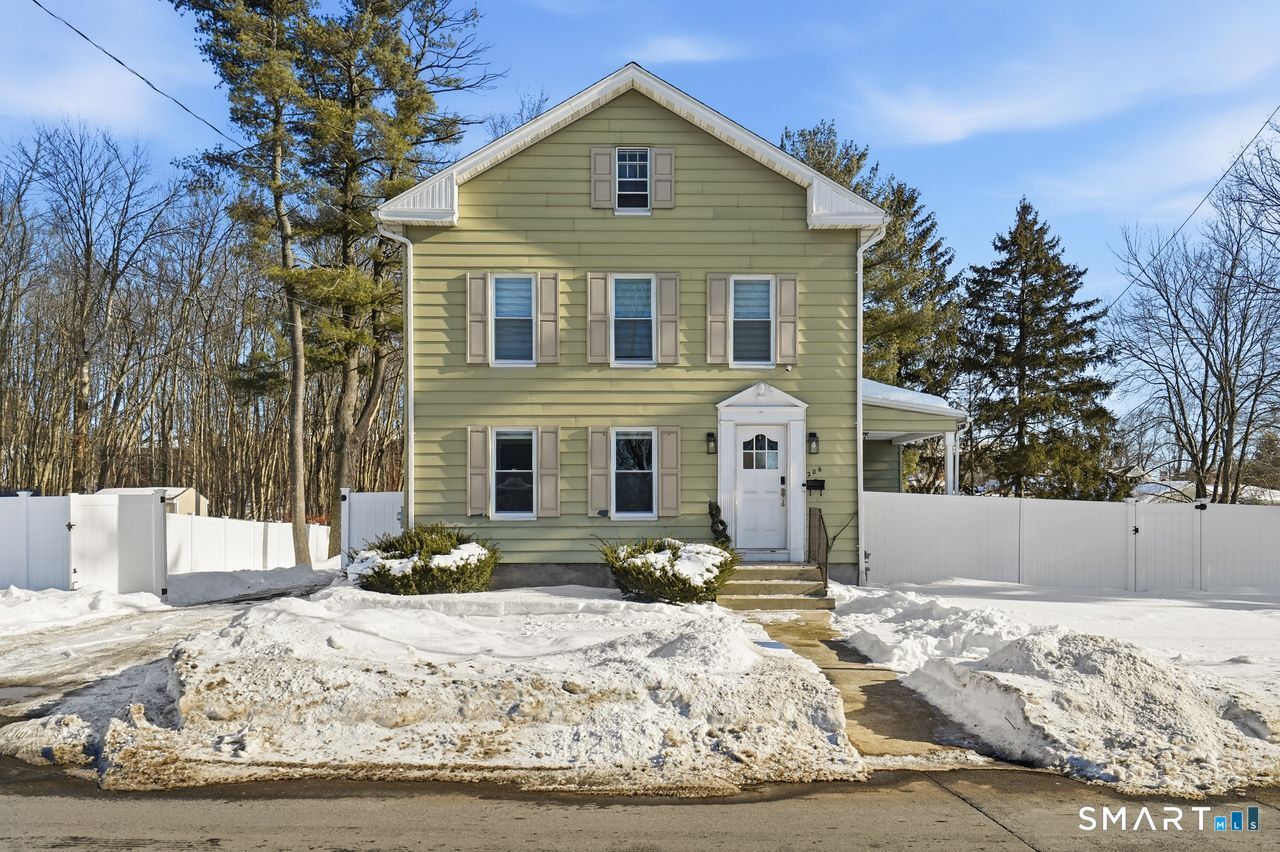 206 Gale Avenue Meriden, CT 06450 - Photo 2 of 33 a front view of a house with a yard covered in snow
