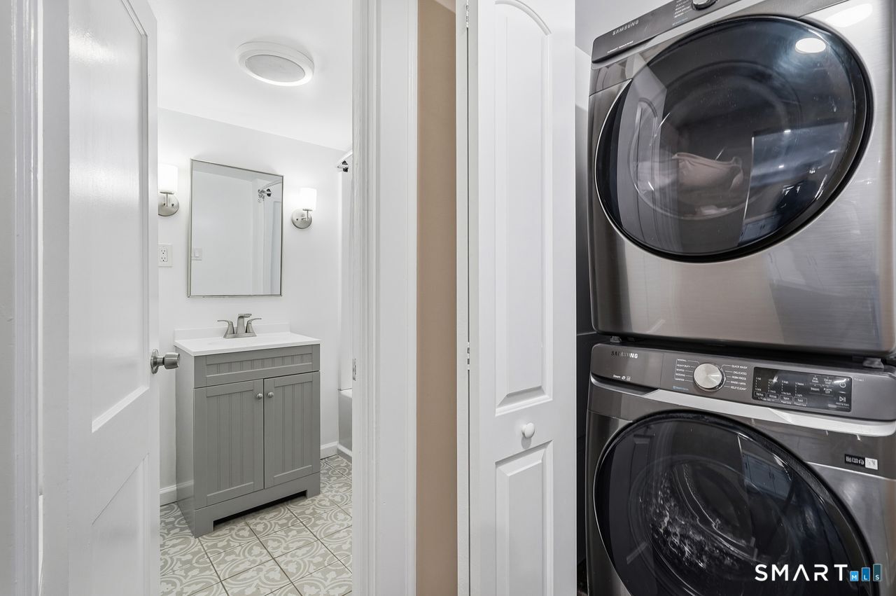 206 Gale Avenue Meriden, CT 06450 - Photo 22 of 33 a utility room with sink dryer and washer