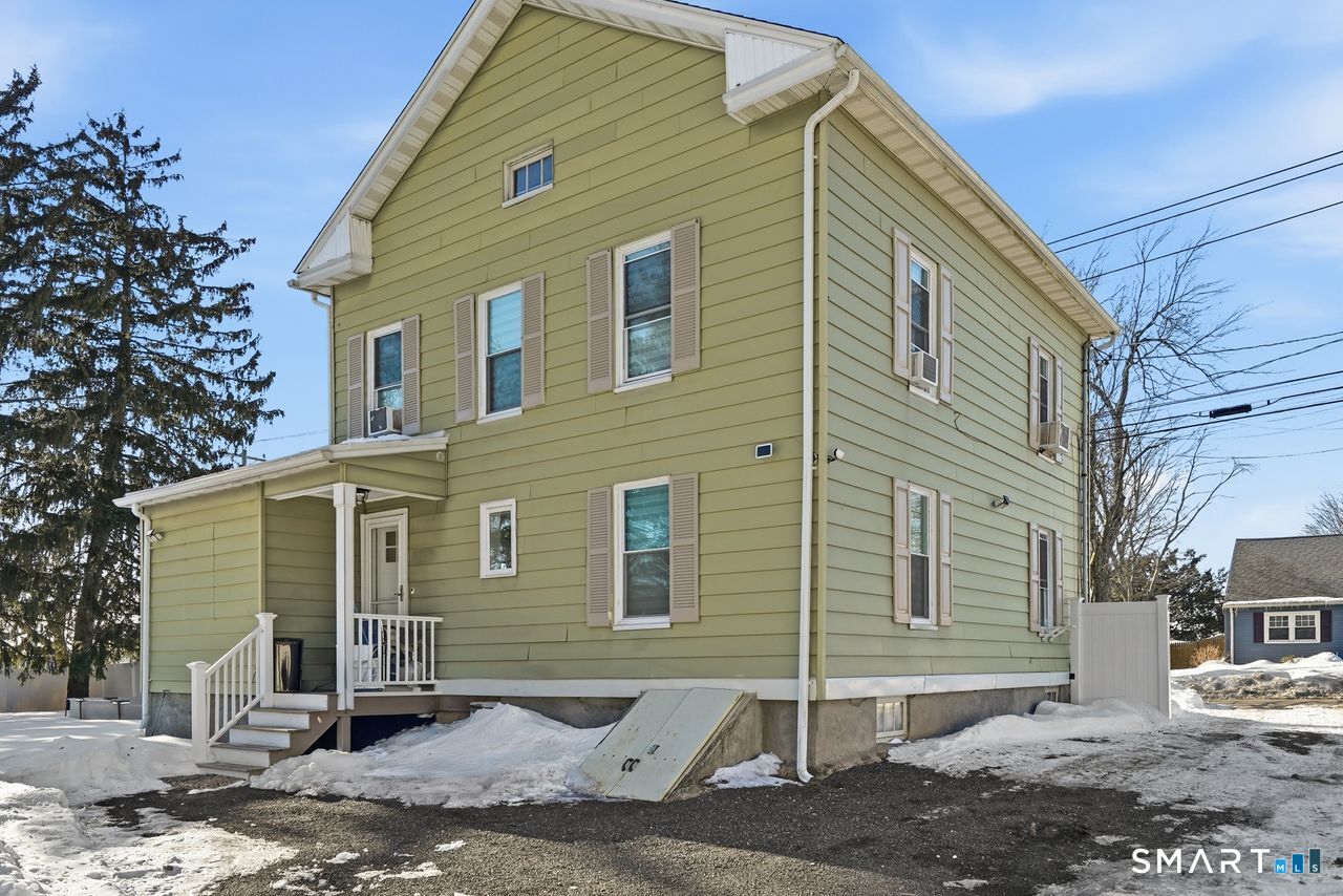 206 Gale Avenue Meriden, CT 06450 - Photo 23 of 33 a view of a house with a yard