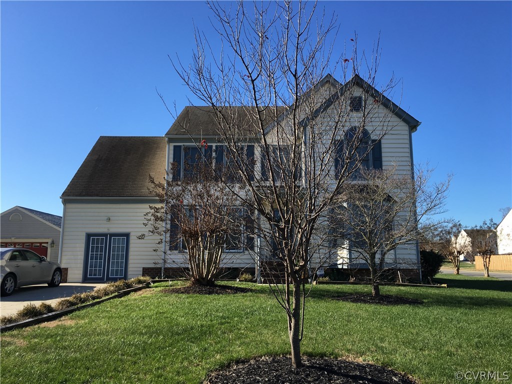 1565 Tree Ridge Road Richmond, VA 23231 - Photo 7 of 14 a view of a house with a yard