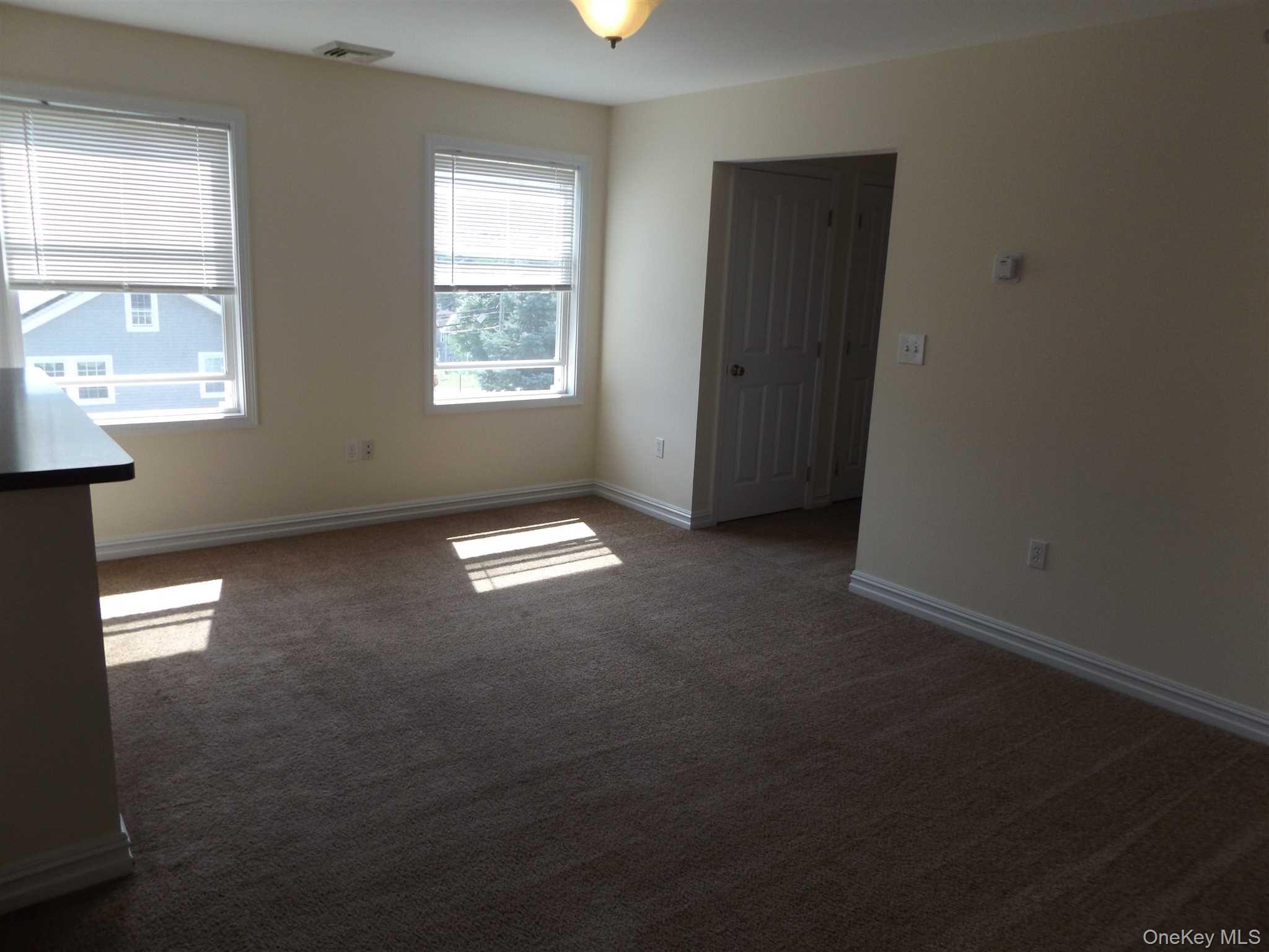 4 State Street, Unit 3 Beacon, NY 12508 - Photo 8 of 20 an empty room with windows