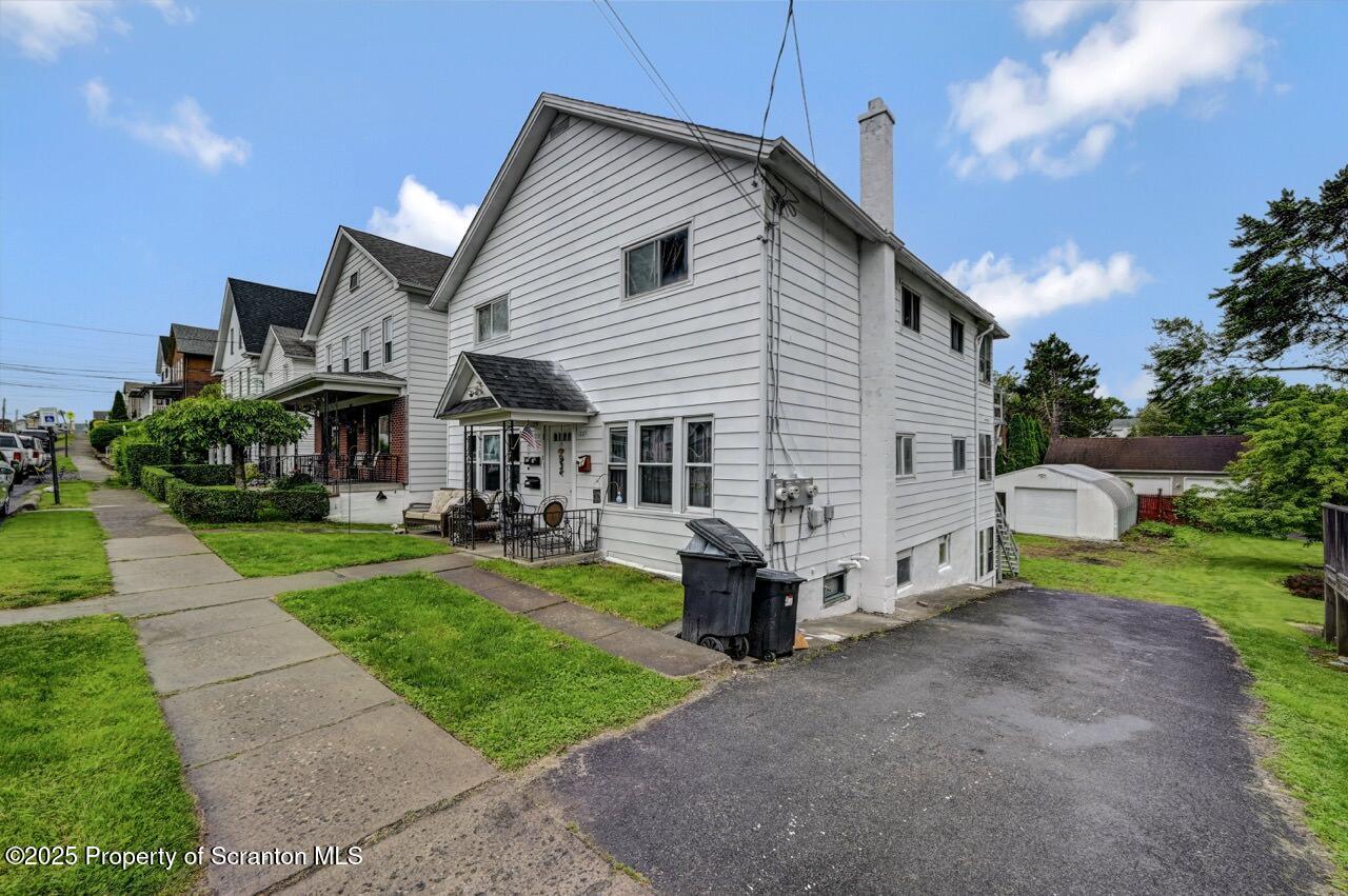 1223 Eynon Street Scranton, PA 18504 - Photo 2 of 42 a view of house that has a yard