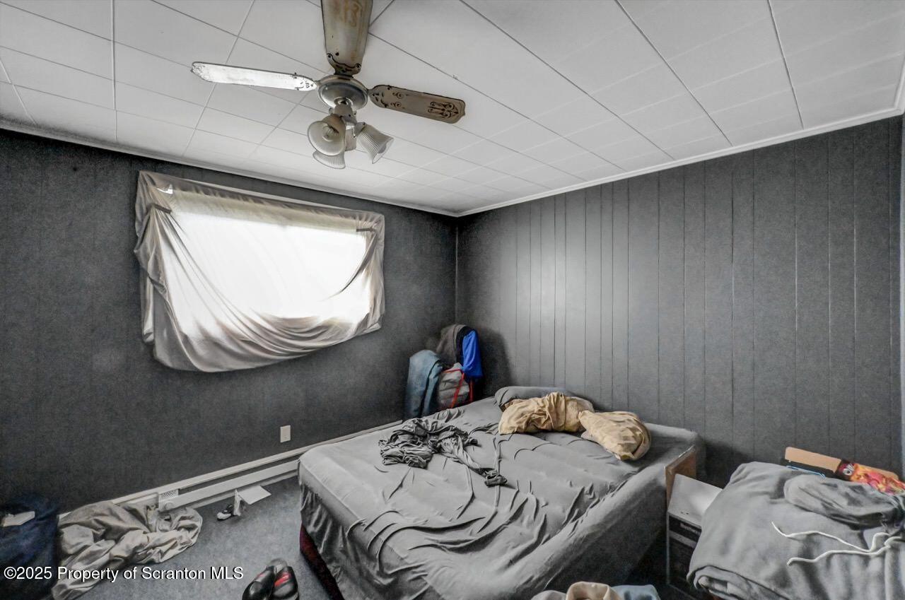 1223 Eynon Street Scranton, PA 18504 - Photo 35 of 42 a bedroom with bed and a window