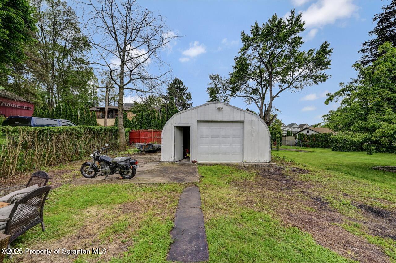 1223 Eynon Street Scranton, PA 18504 - Photo 39 of 42 a front view of a house with garden