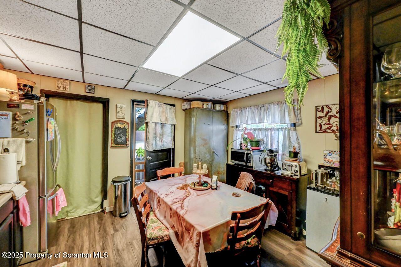 1223 Eynon Street Scranton, PA 18504 - Photo 7 of 42 a dinning table and chairs in a patio