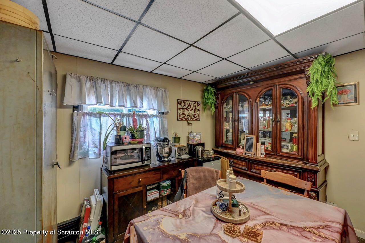 1223 Eynon Street Scranton, PA 18504 - Photo 10 of 42 a room with furniture and wooden floor