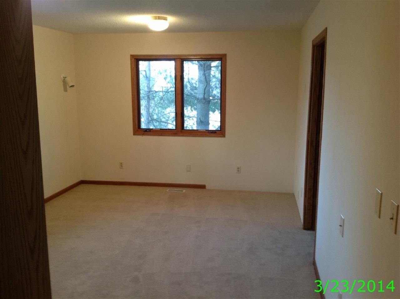 305 Redman Way Southwest Poplar Grove, IL 61065 - Photo 9 of 13 an empty room with windows