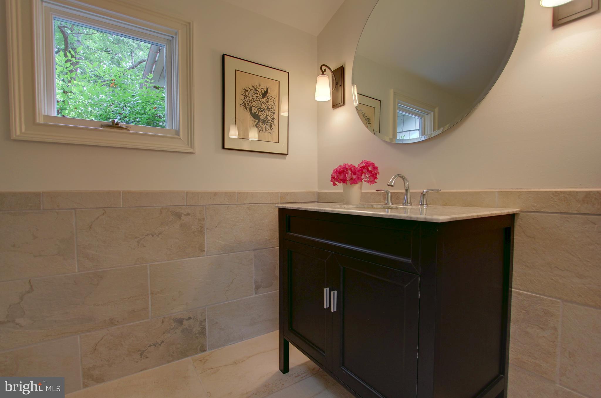 13705 Loria Court Clarksville, MD 21029 - Photo 12 of 30 a bathroom with a sink vanity and a window