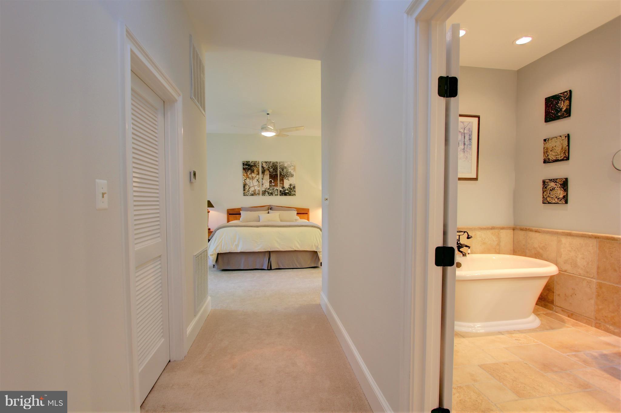 13705 Loria Court Clarksville, MD 21029 - Photo 13 of 30 a bathroom with a sink a toilet and shower