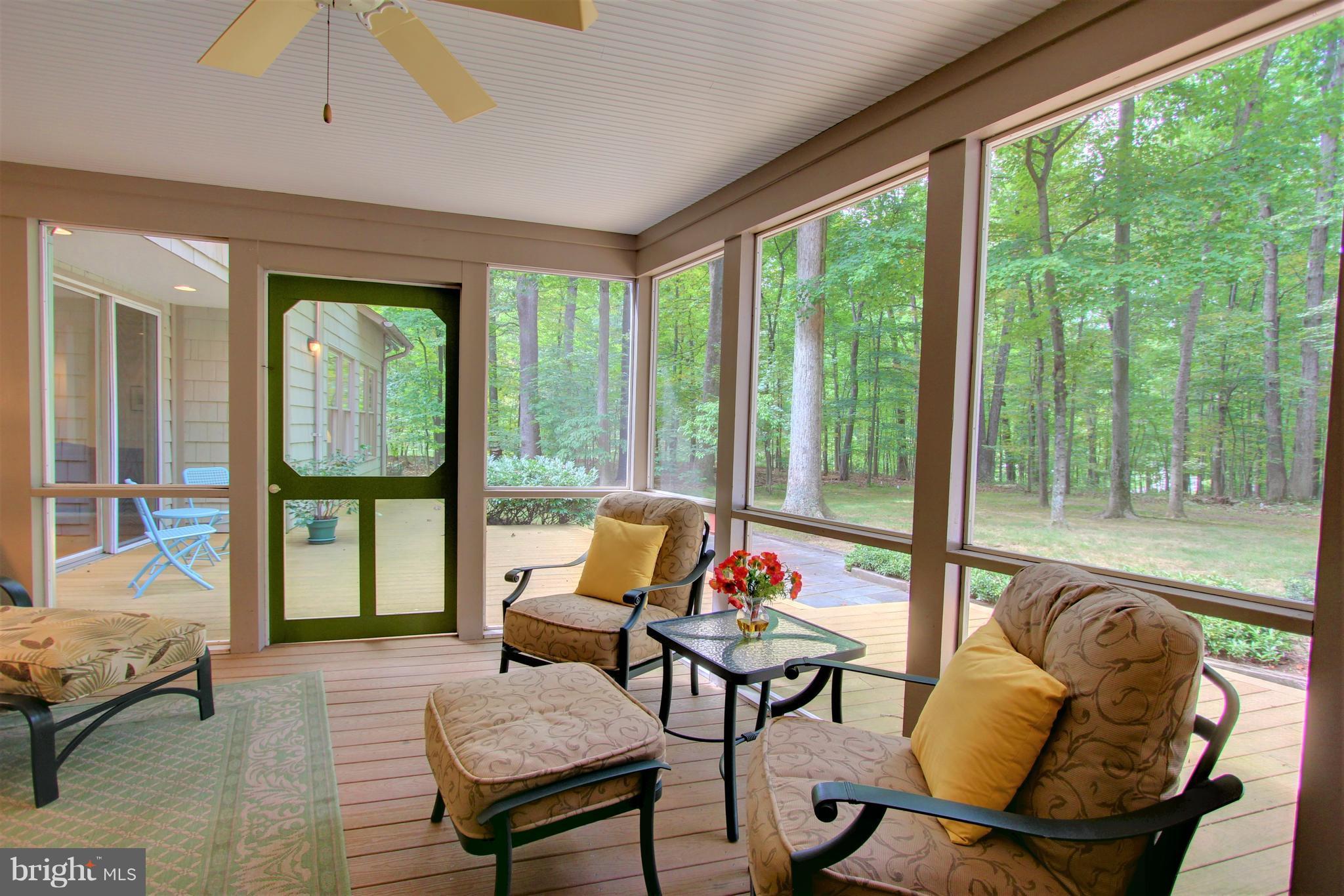 13705 Loria Court Clarksville, MD 21029 - Photo 25 of 30 a living room with furniture and a floor to ceiling window