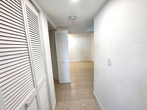 a bathroom with a sink and a shower
