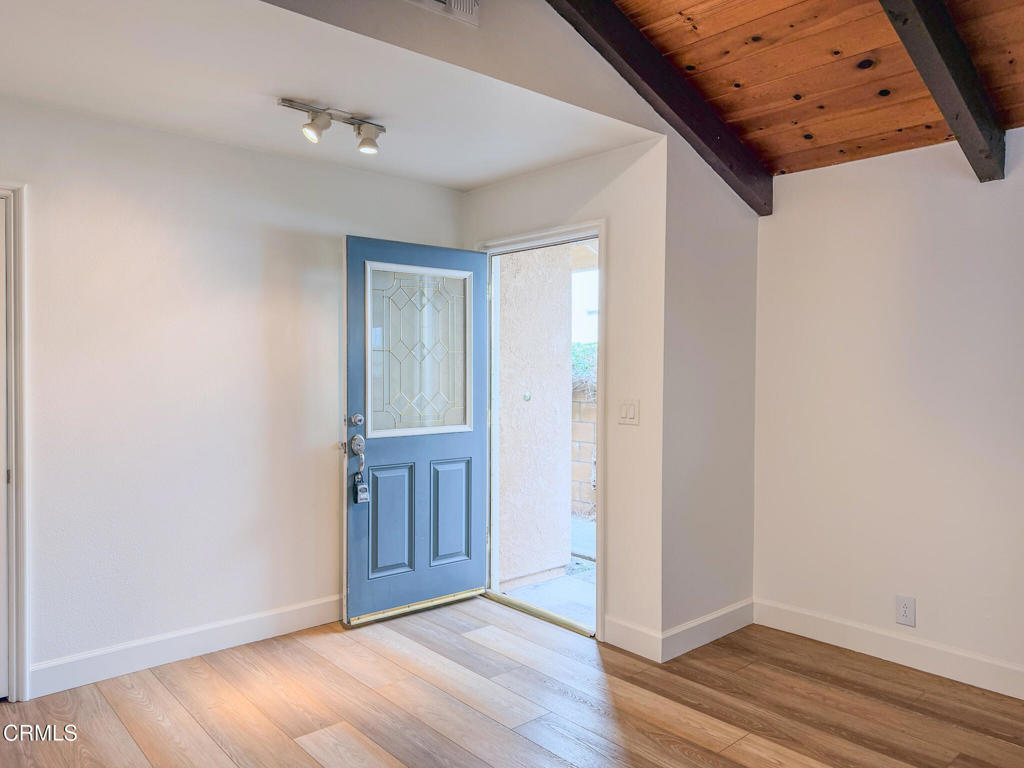 5142 Sandpiper Way Oxnard, CA 93035 - Photo 12 of 51 a view of an empty room with wooden floor