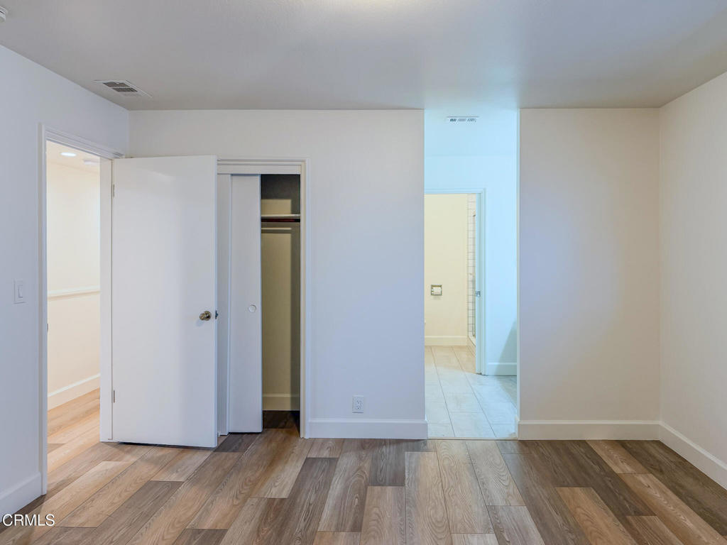 5142 Sandpiper Way Oxnard, CA 93035 - Photo 30 of 51 a view of an empty room with wooden floor