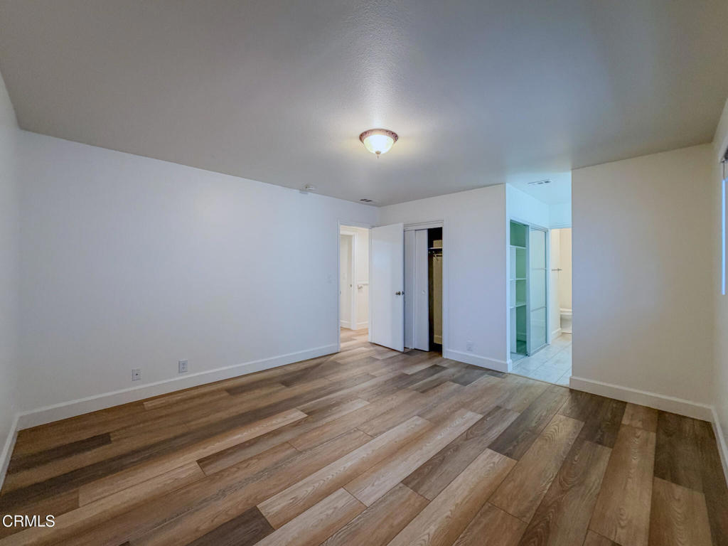 5142 Sandpiper Way Oxnard, CA 93035 - Photo 31 of 51 a view of an empty room with wooden floor