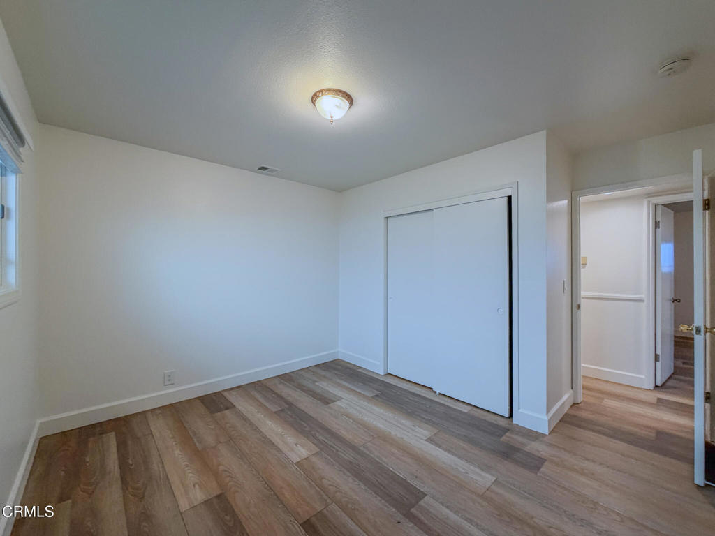 5142 Sandpiper Way Oxnard, CA 93035 - Photo 37 of 51 a view of room with wooden floor