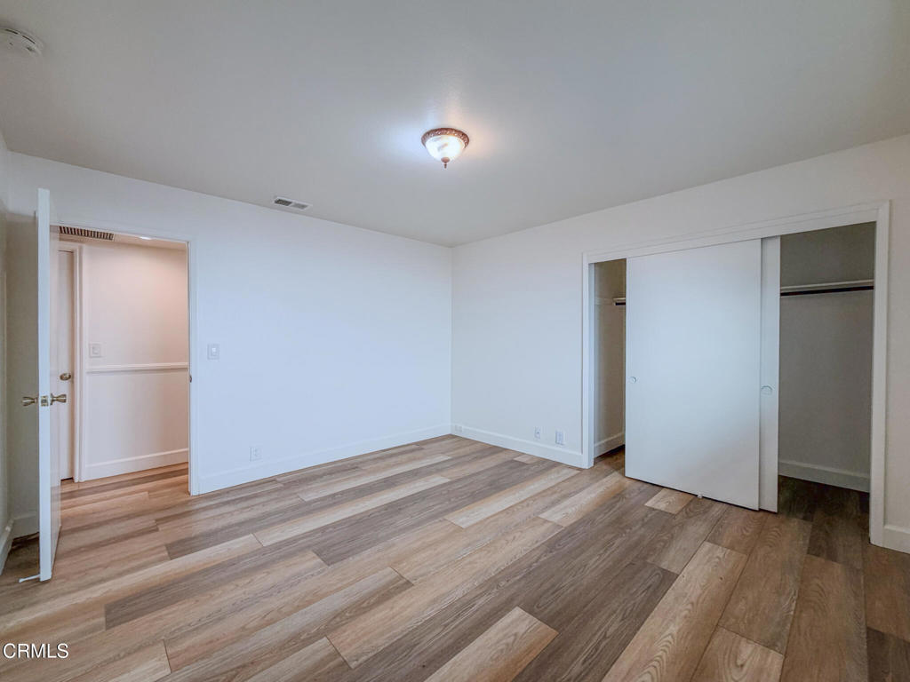 5142 Sandpiper Way Oxnard, CA 93035 - Photo 39 of 51 a view of empty room with wooden floor